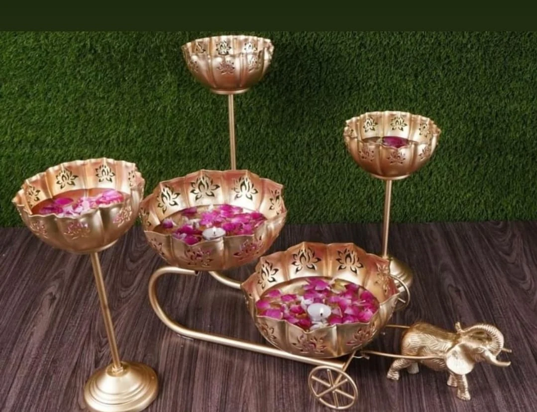 Decorative bowls and cart styled with flower petals